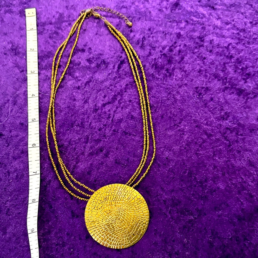 Gold Cooper Multi-Strand Beaded Necklace with Textured Medallion
